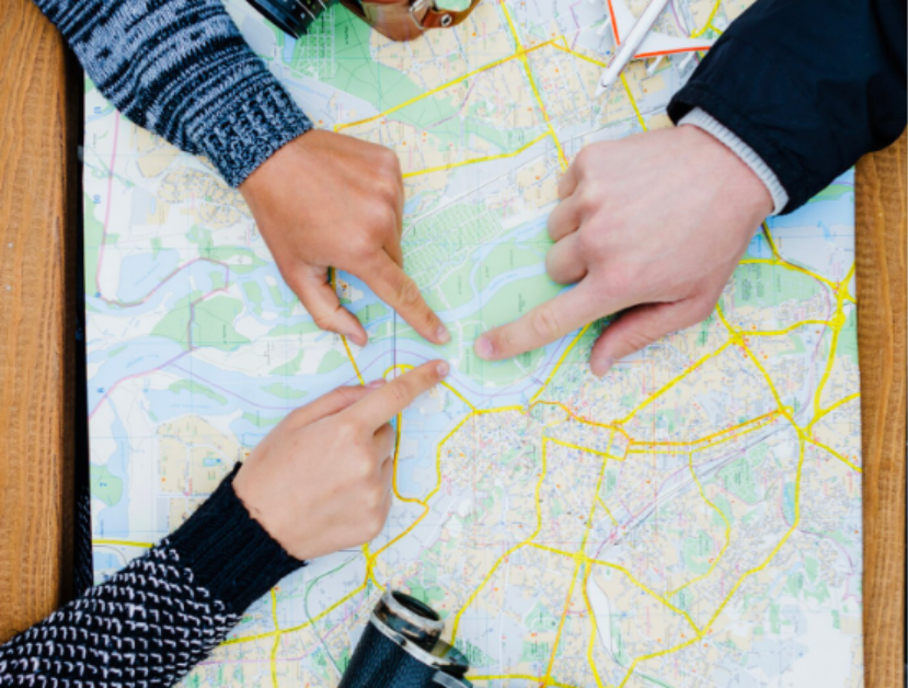 A group of people deciding their next destination 